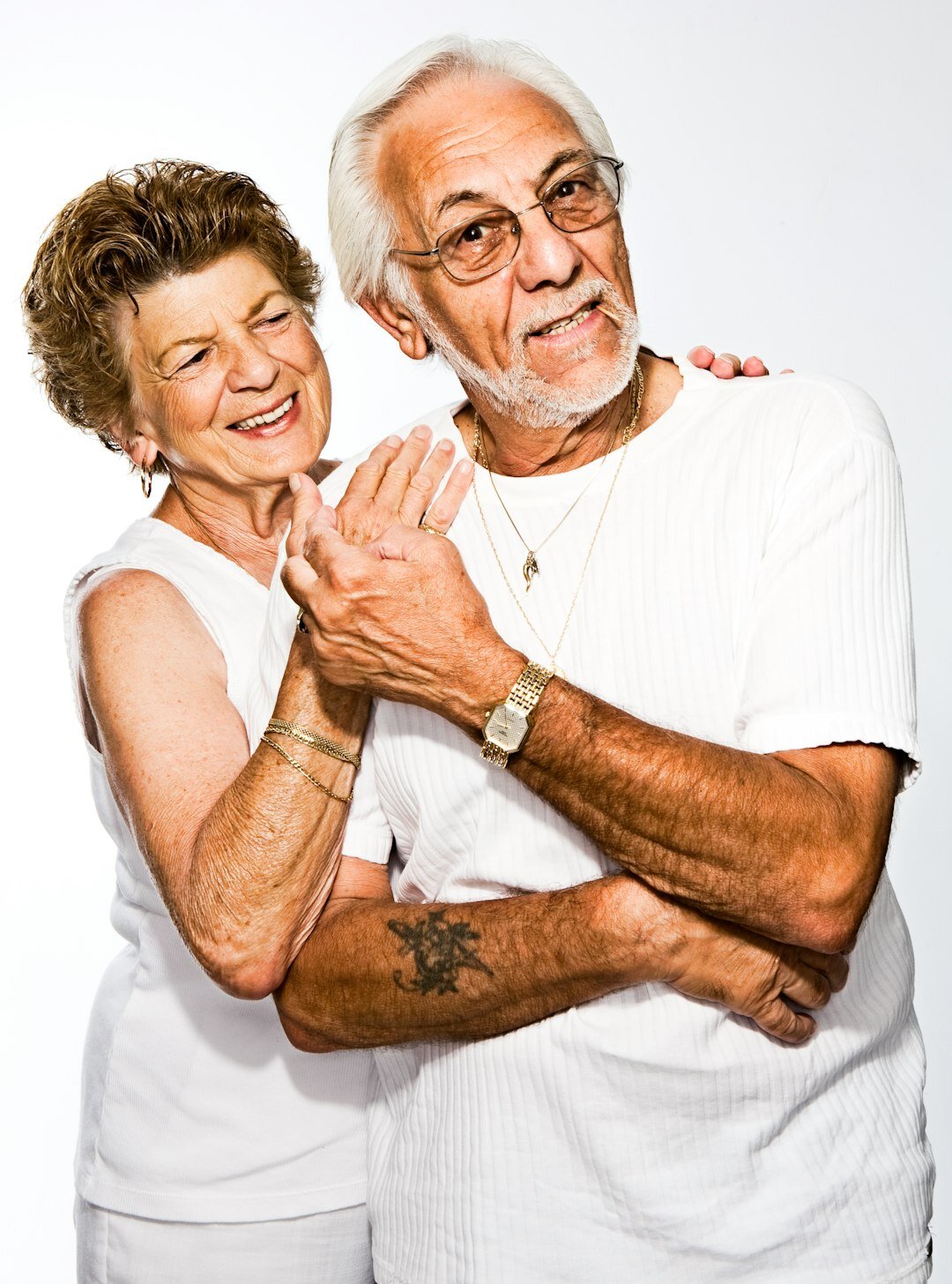 Smiling Slovak senior couple sitting together at home
