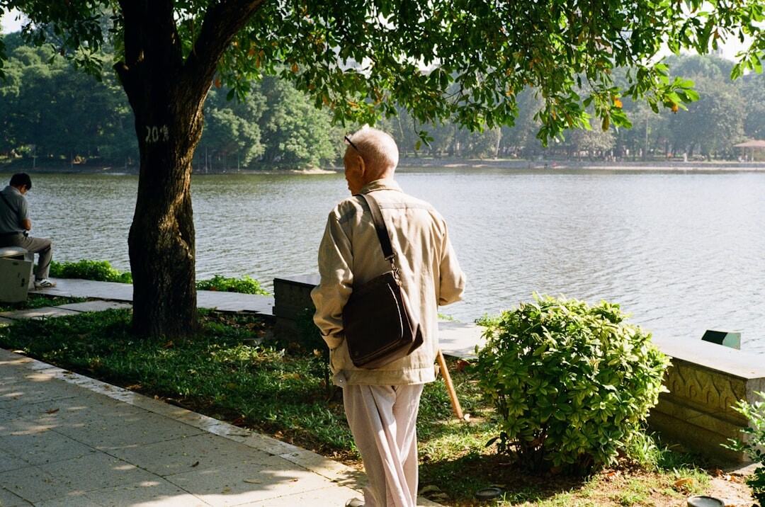 senior walking in park